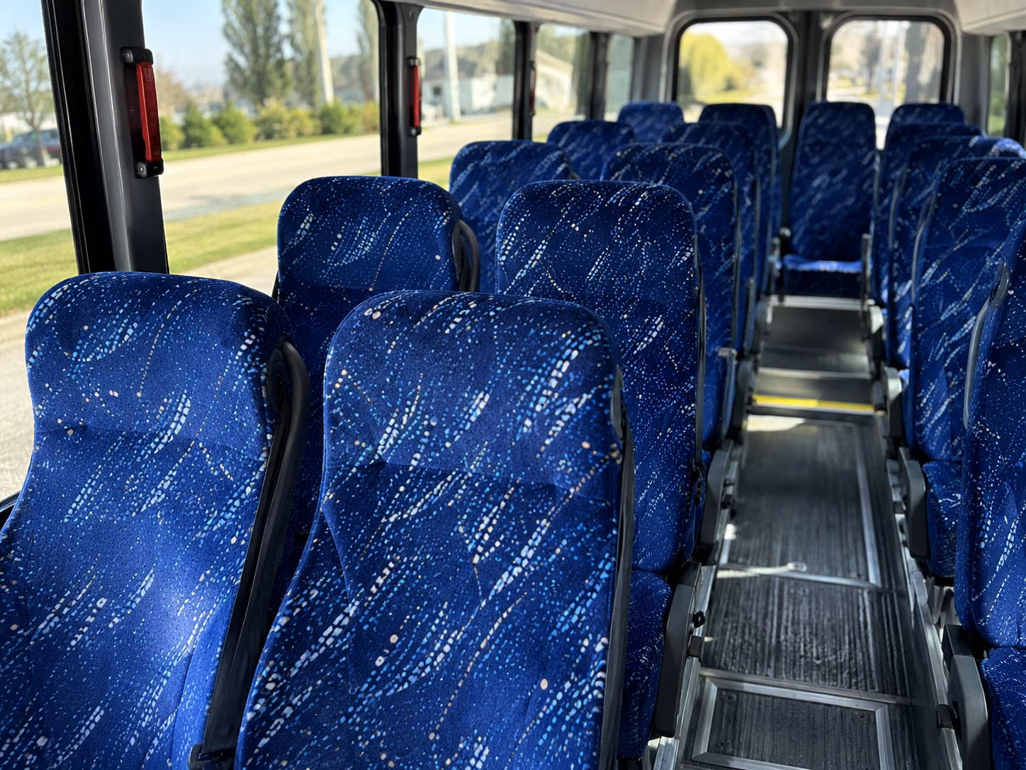ann arbor sporting event transportation onboard seating
