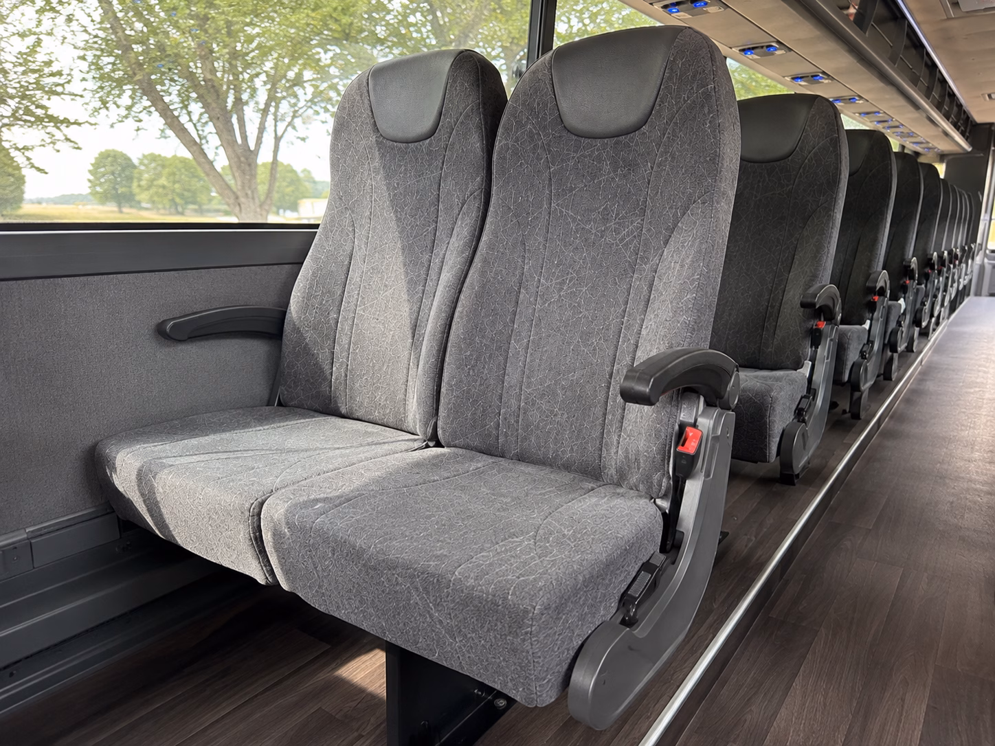 how your starting location and deadhead miles affect charter bus rates in ann arbor